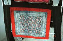 to Jpeg 37K Batik, appliqué detail  from Black Hmong baby carrier collected in Sa pa, Northern Vietnam 9511a19